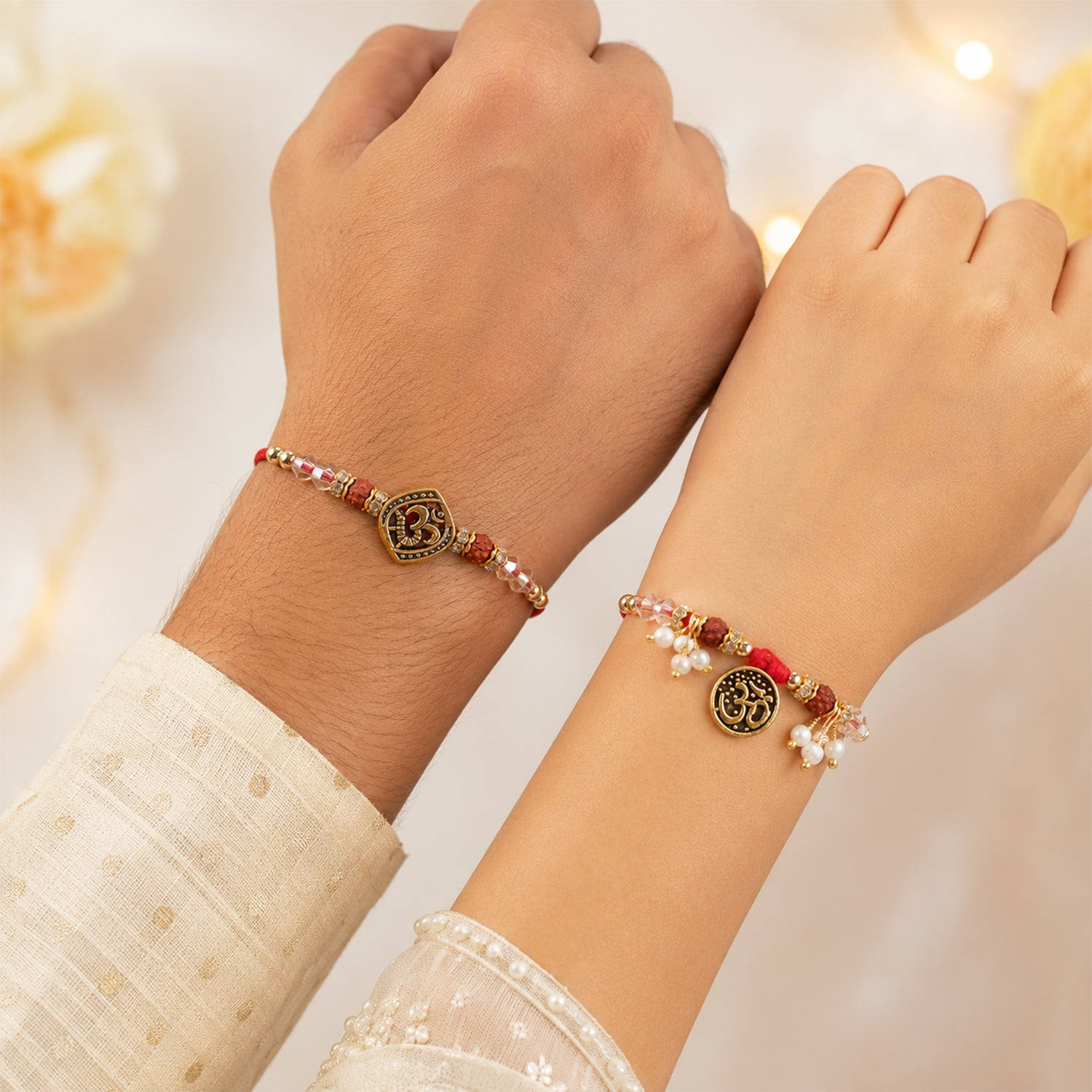 Graceful OM Symbol Bhai Bhabhi Rakhi with OM Medallion and Pearl Tassel for Gifting