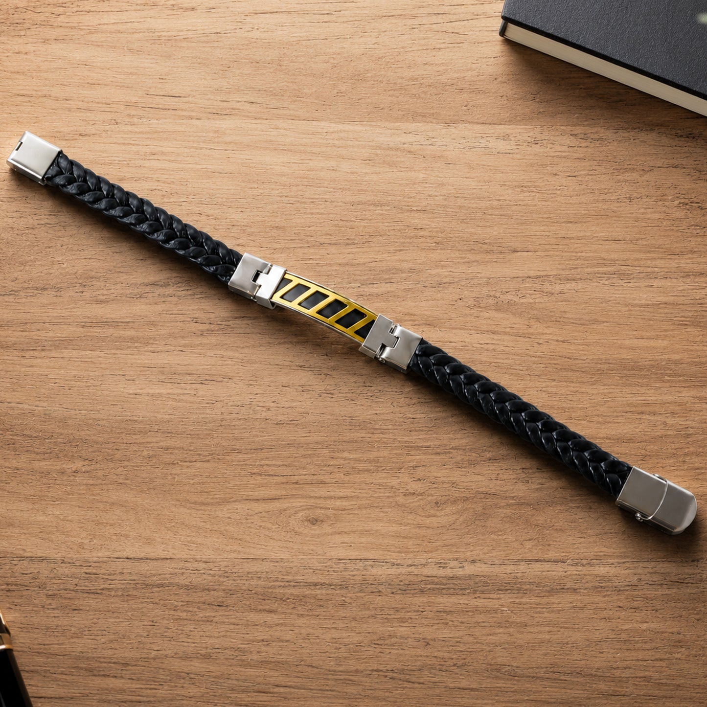 Stripe Bracelet Rakhi with Black Braided Band and Dual-Tone Plate for Raksha Bandhan