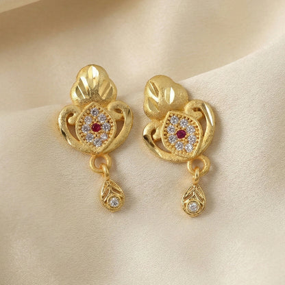 Ethnic Floral Motif Gold Stud Earrings With Stone Center And Elegant Drop Finish
