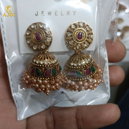 Elegant antique gold jhumka earrings with pearl bead clusters