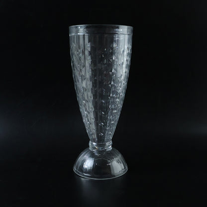 Close-up of transparent plastic drinking glass