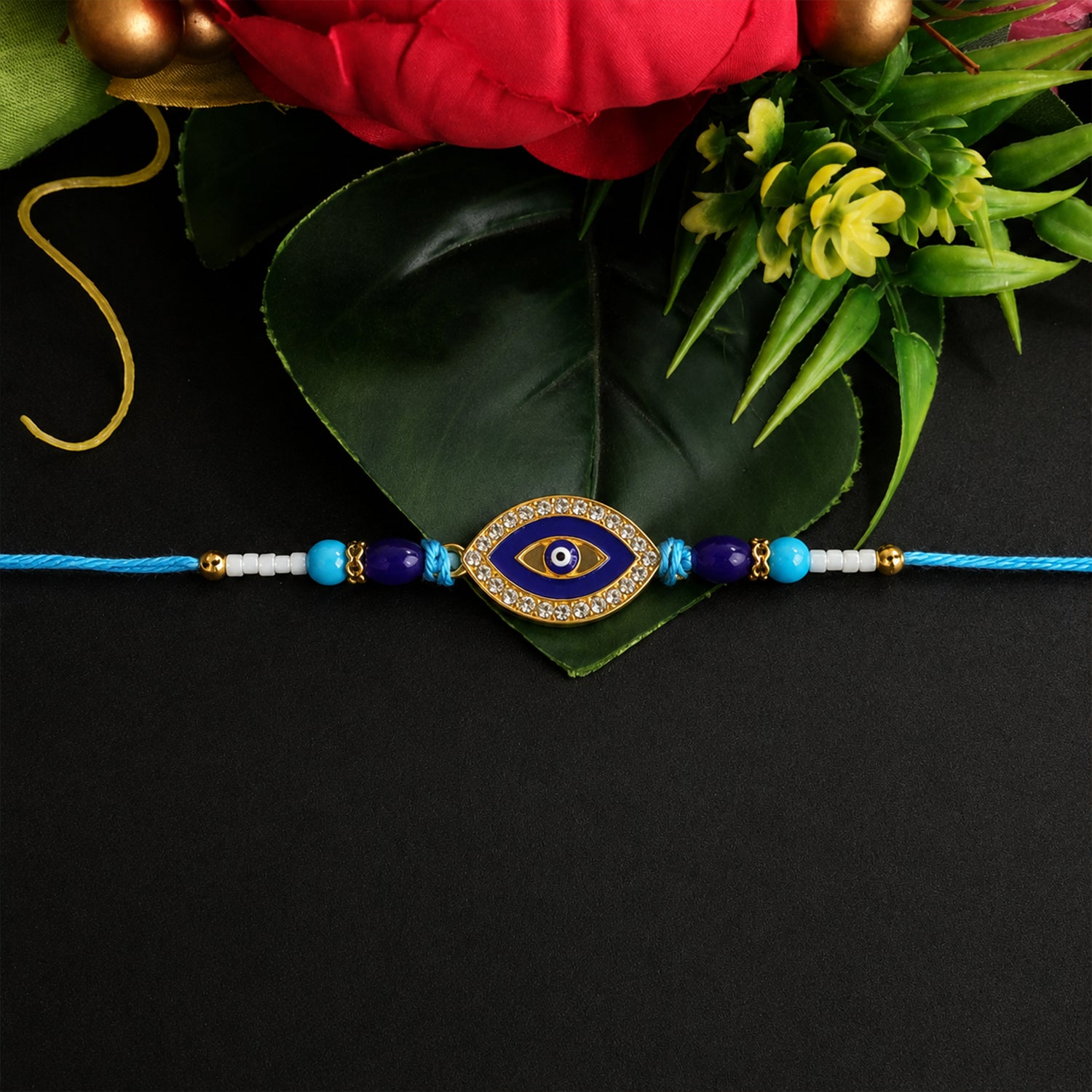 Evil Eye Rakhi with crystal beads close-up
