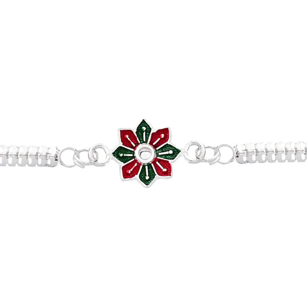 Elegant silver floral rakhi with a small protective pouch