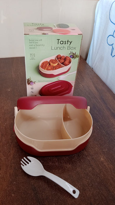 Pink lunch box with three stainless steel compartments and spoon holder