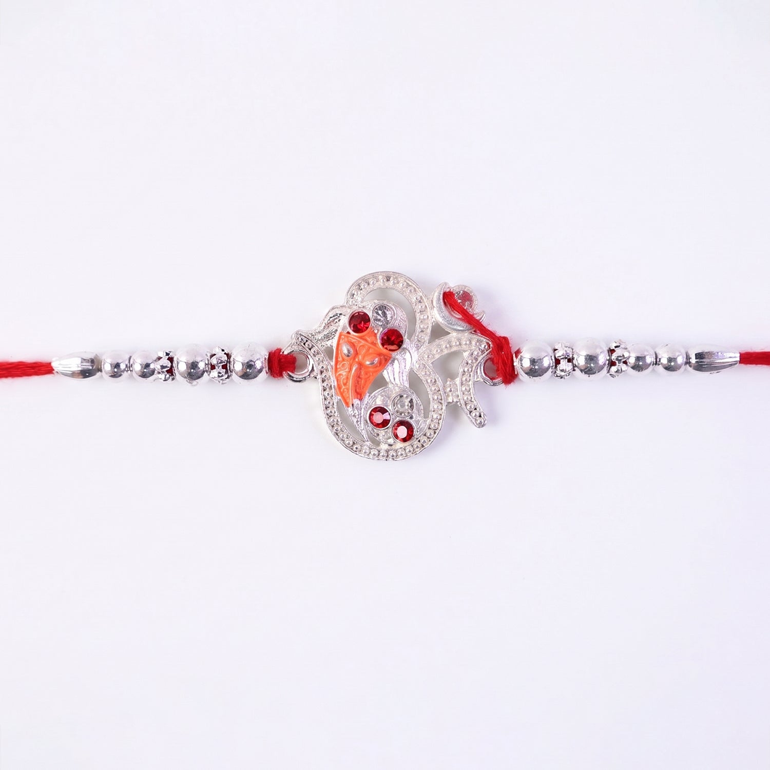 Silver Om Ganesh Rakhi with Red Stones and Metal Bead Chain