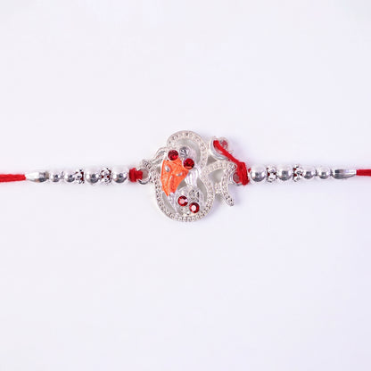 Silver Om Ganesh Rakhi with Red Stones and Metal Bead Chain