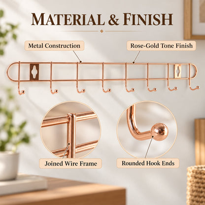 A rose gold metal wall hanger with eight hooks highlights its metal construction, joined wire frame, and rounded hook ends.