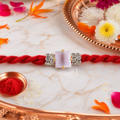 Red Twisted Cord Rakhi with a Bold Square Crystal Stone Pendant