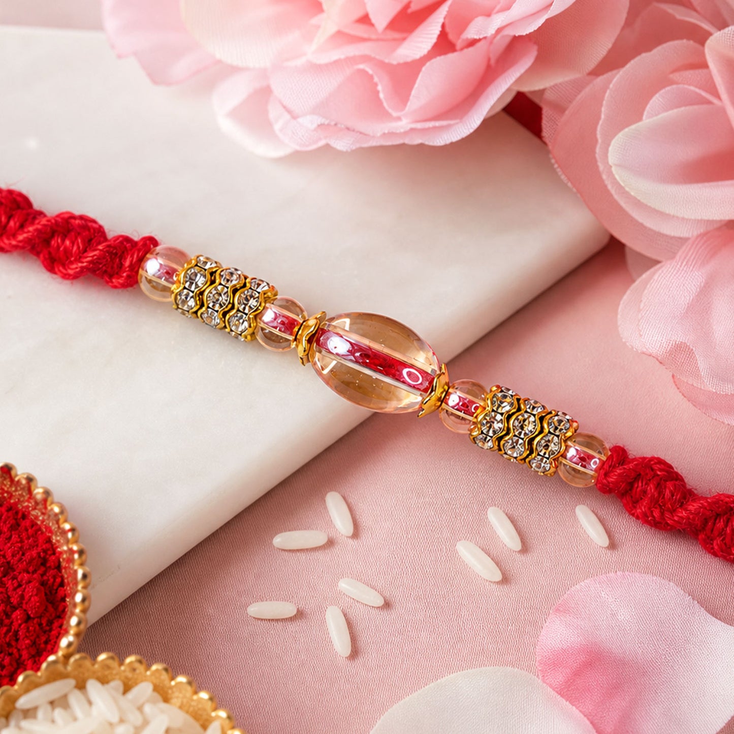 Red Twisted Cord Rakhi with Crystal Bead and Golden Accents