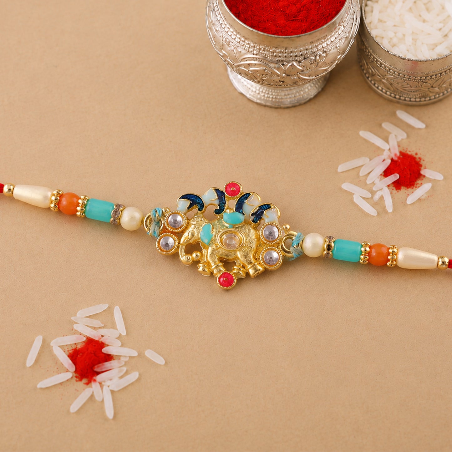 Festive Rakhi featuring Ornate Floral Charm and bead line in gift style for Gift Use