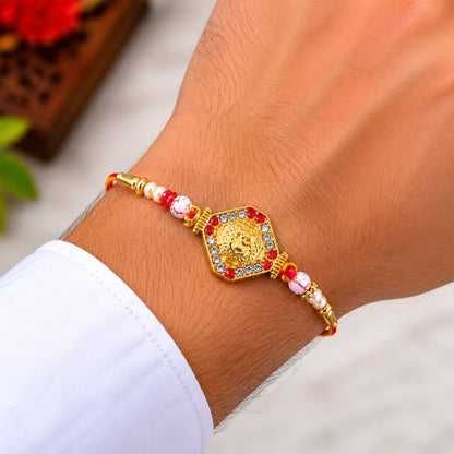 Ganesh Rakhi with Golden Beads and Red-Yellow Thread