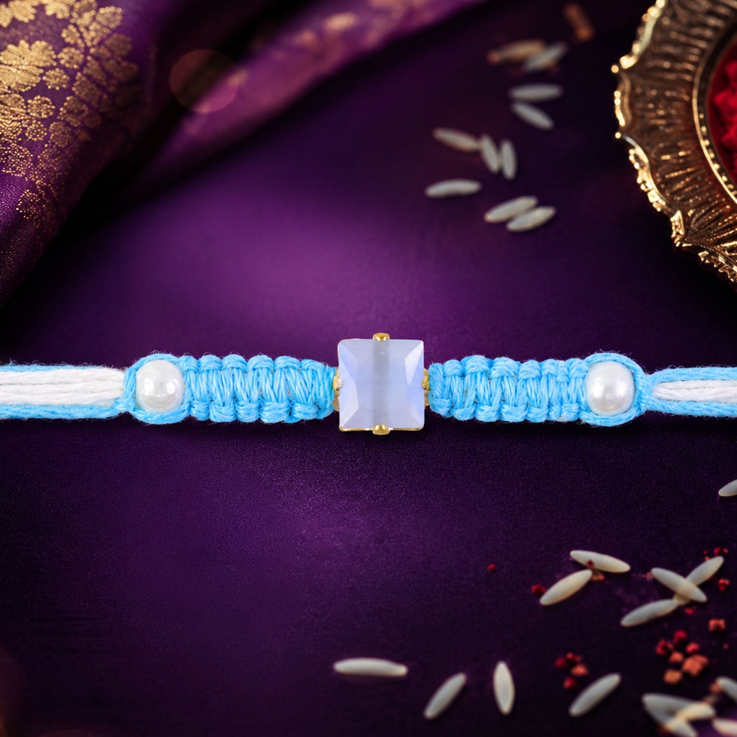 Blue Square Stone Macrame Rakhi with Pearl Beads, Silver Accents and Soft Thread