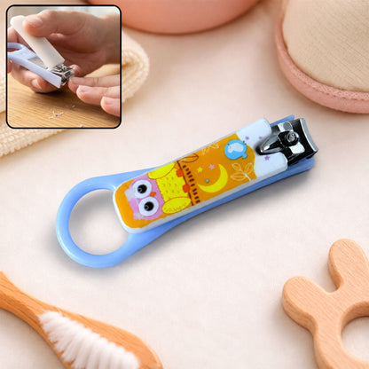 A light blue baby nail clipper with a yellow and white owl design, shown with an inset of it being used.