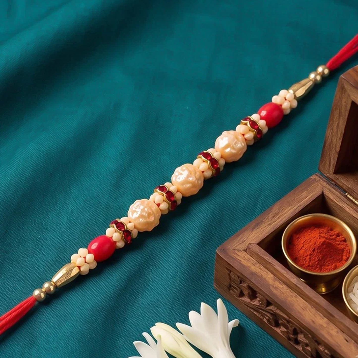 Goden Floral Pearl Beads Crystal Designer Rakhi with Cute Doll Keychain Combo (2 Pc)