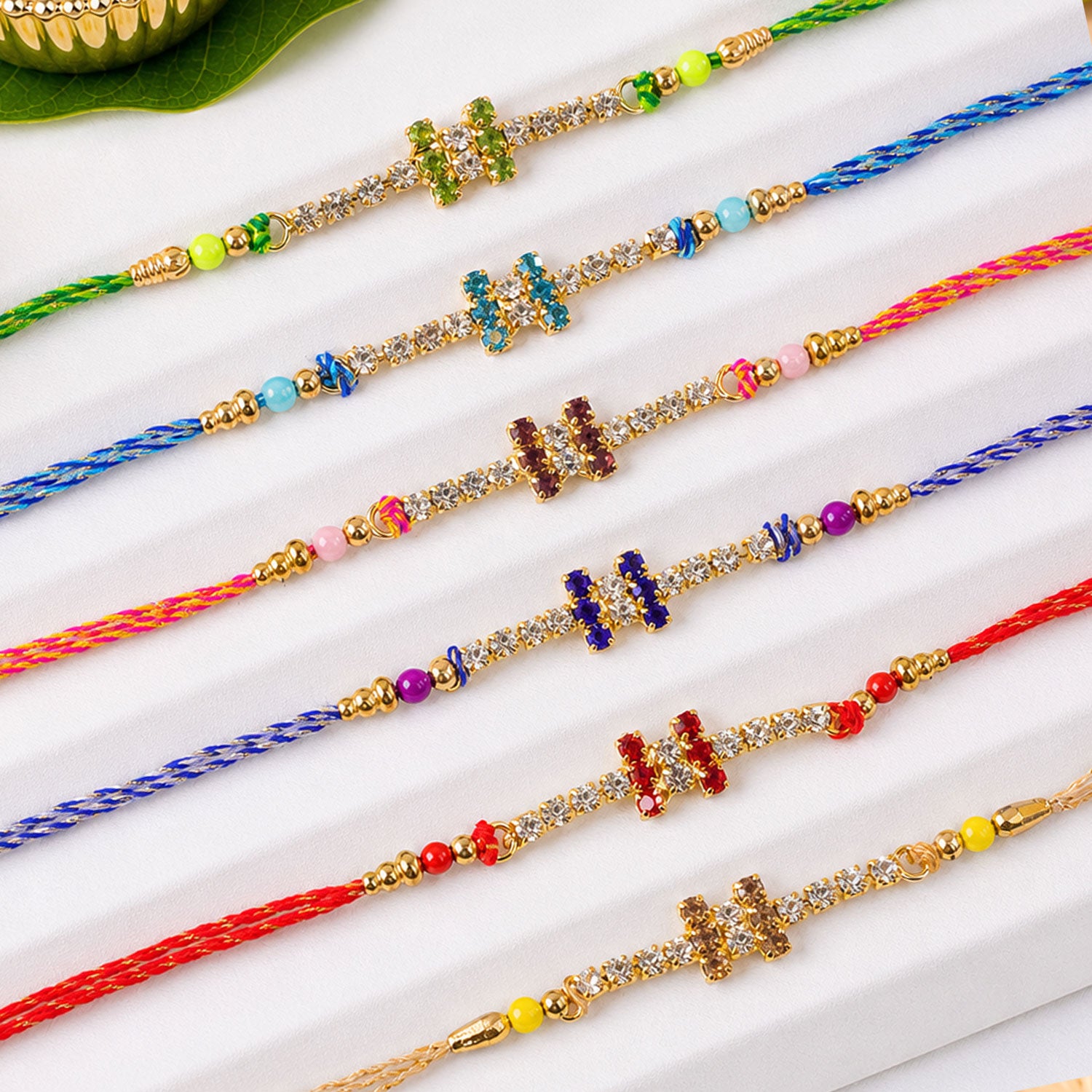 Compact Twin Bar Stone Rakhi in Mix Colour Threads (Pack of 6)
