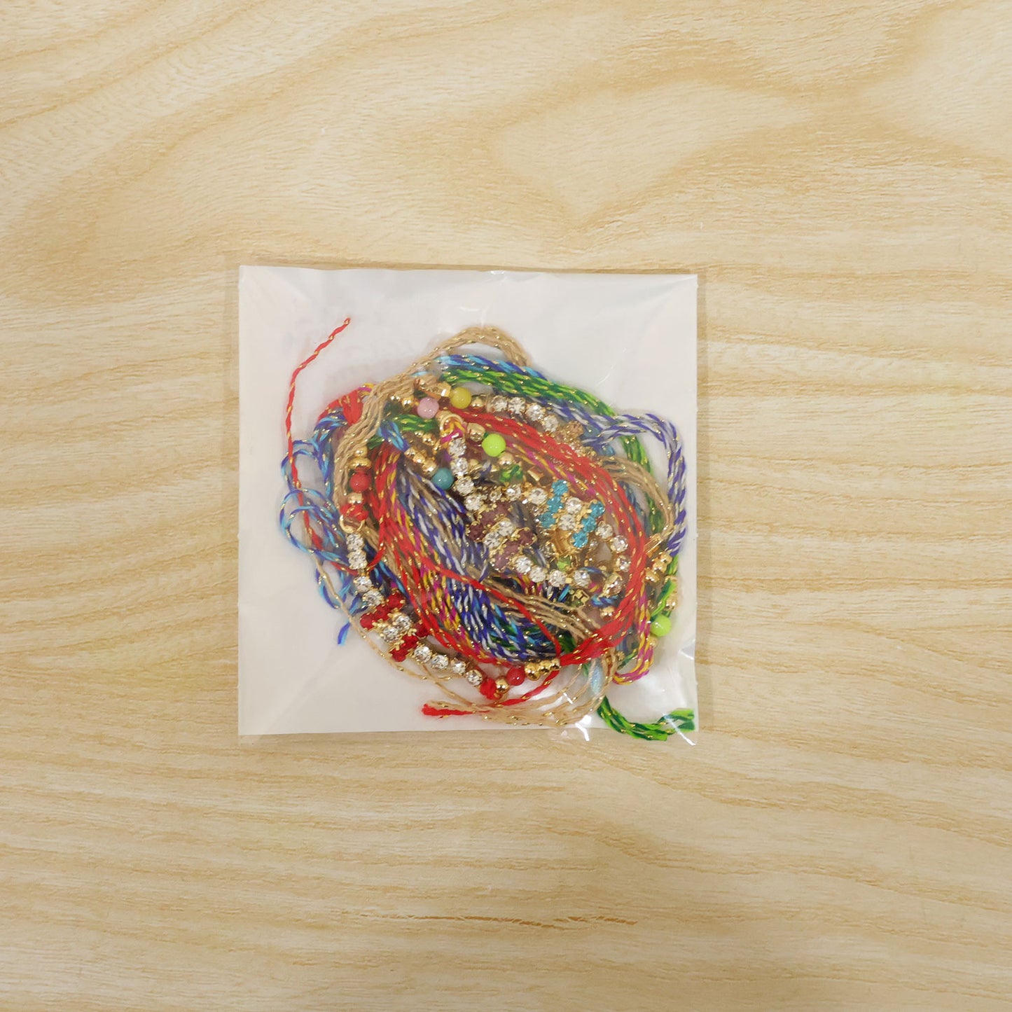 Compact Twin Bar Stone Rakhi in Mix Colour Threads (Pack of 6)