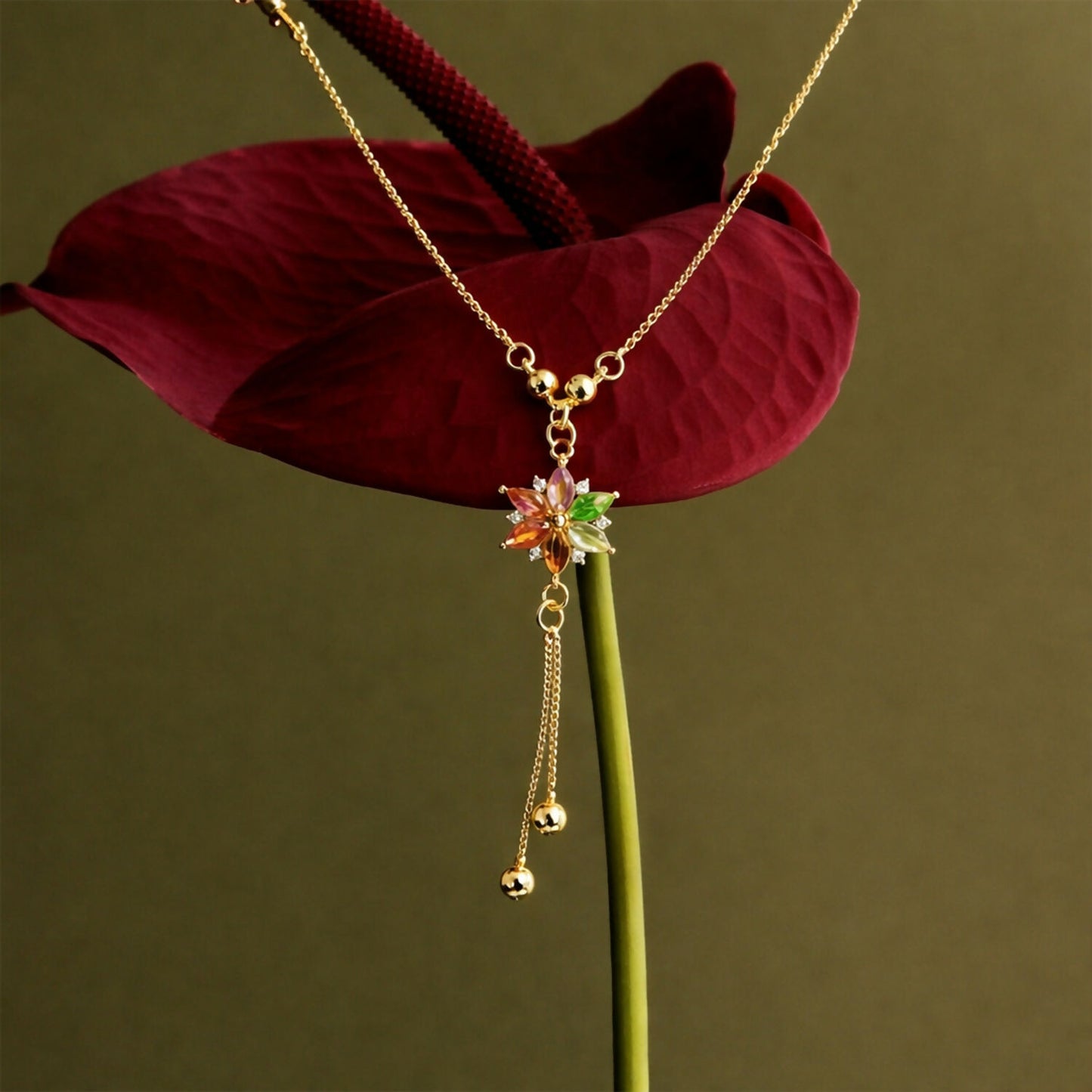 Close-up of multicolor crystal flower pendant with sparkling stones