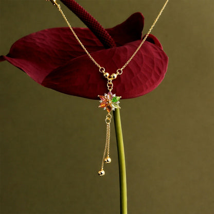 Close-up of multicolor crystal flower pendant with sparkling stones