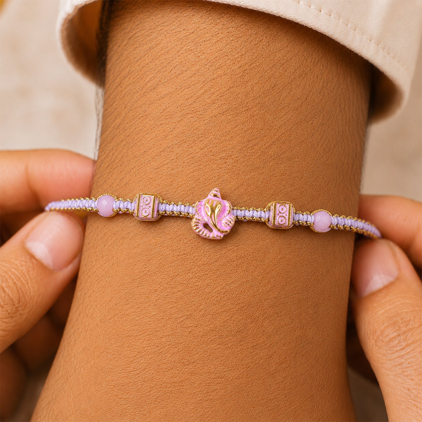 Pink Bracelet Designer Rakhi with Pearl Style Beads and Soft Festive Finish