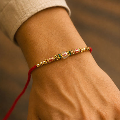 Red Green Stone Golden Designer Rakhi with Traditional Beads and Festive Thread