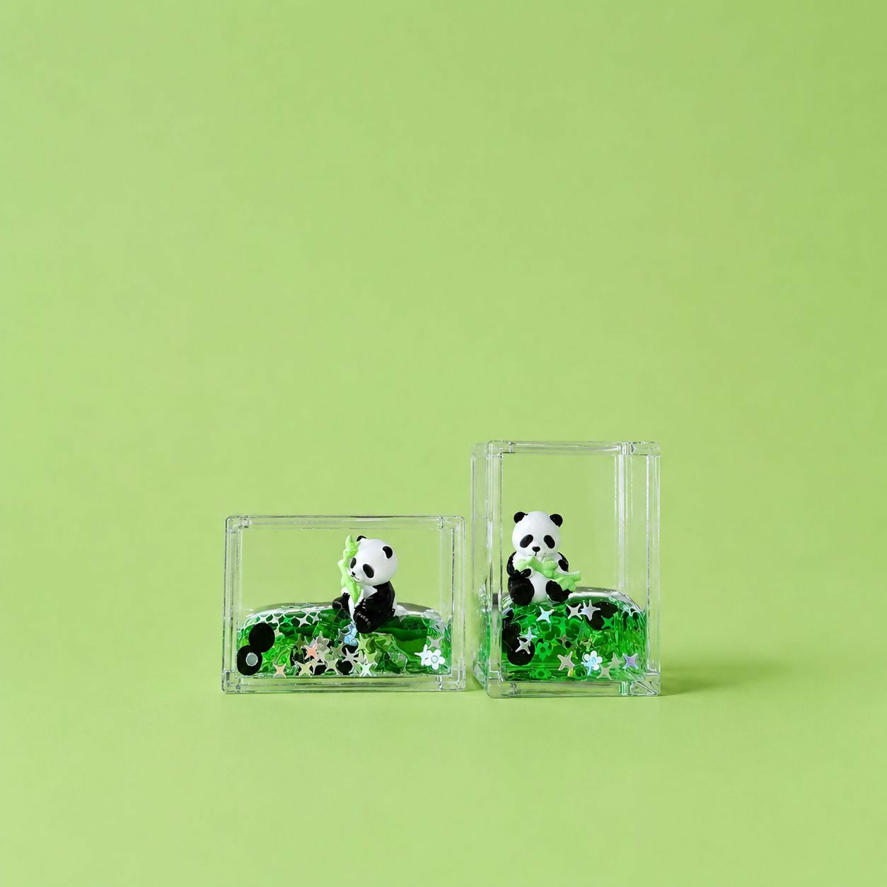 Transparent block with floating glitter and panda figure inside