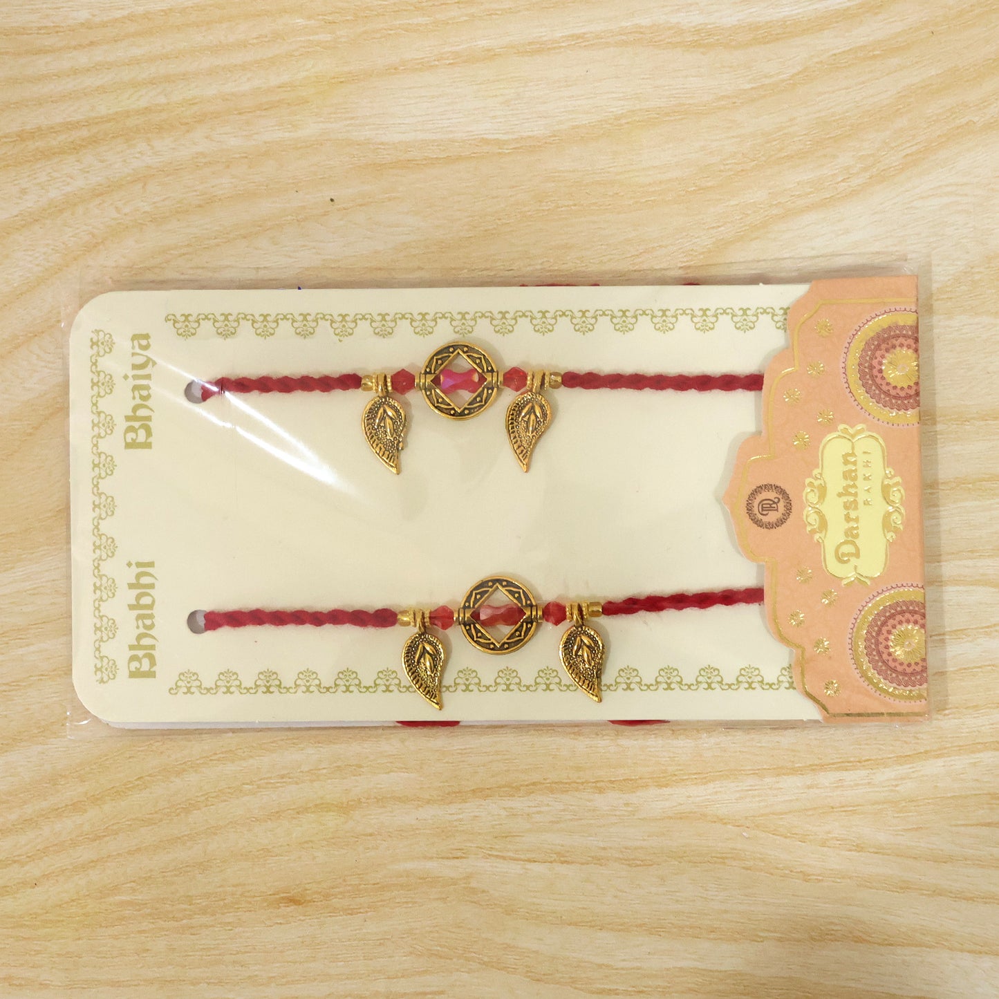 Couple Rakhi Set with Red Thread, Amber Stone, Leaf Charms and Gold Beads