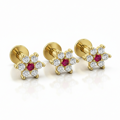 Pack of three gold plated flower labret studs with ruby and crystal floral design