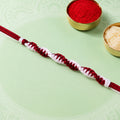 Maroon-White Twisted Cord Rakhi with Simple Beadless Design