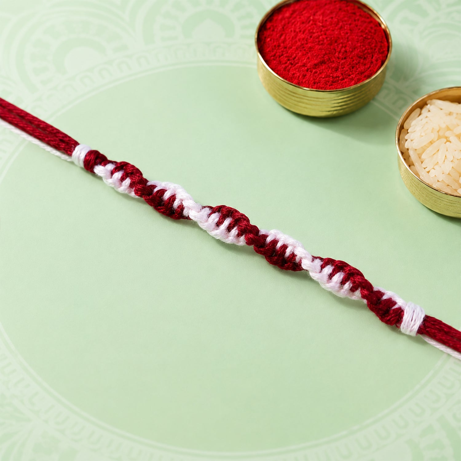 Maroon-White Twisted Cord Rakhi with Simple Beadless Design