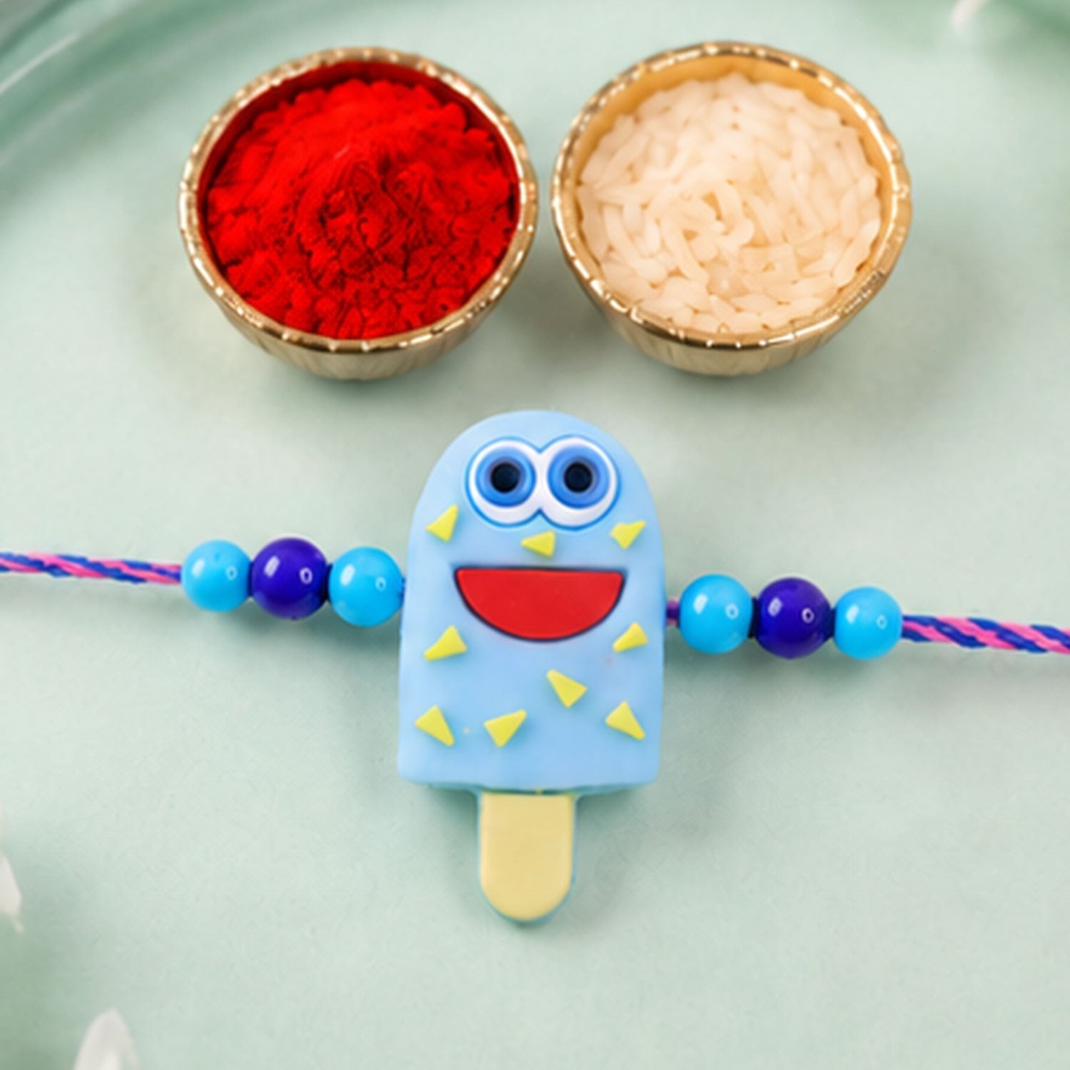 Blue Popsicle Character Rakhi with Chocolate Almonds, Pack of 2