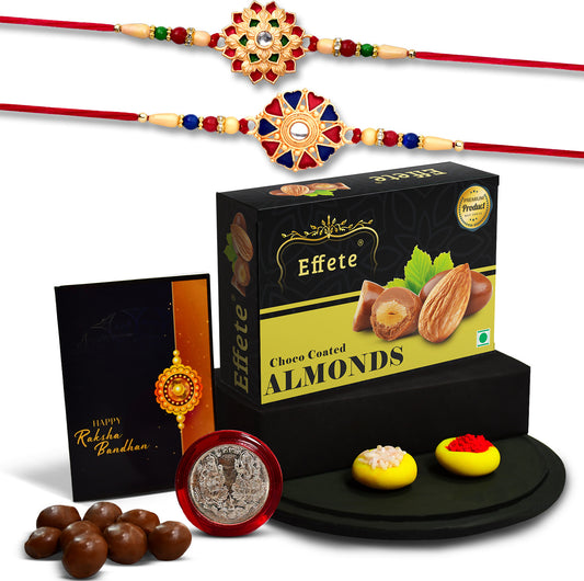 Premium Rakhi Gift Set for Brother – 2 Traditional Rakhis with Choco Almonds, Silver Coin, Roli Chawal & Festive Greeting Card