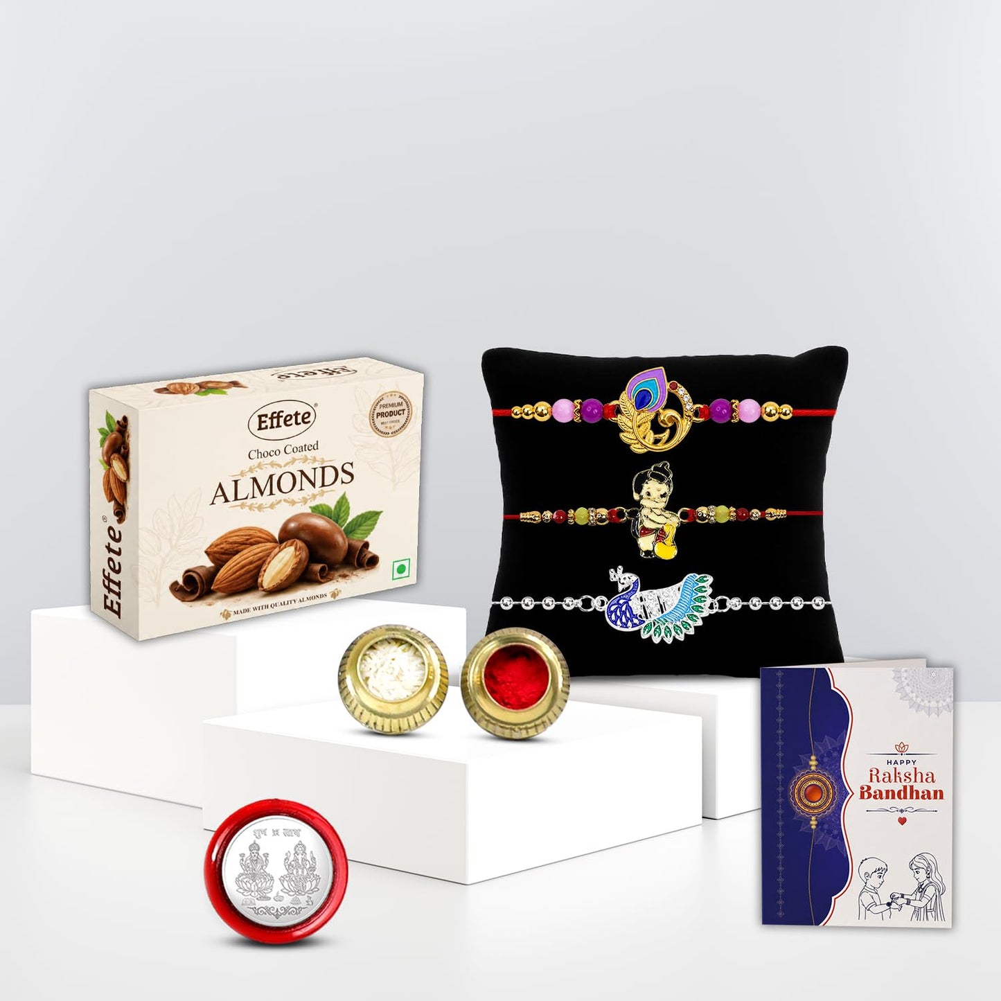 Rakhi with Chocolate for Brother (Set of 7) – Raksha Bandhan Festival Celebrations with Bal Hanuman, Feather & Peacock Design Rakhi, Chocolate, Roli Chawal, Silver Color Coin & Greeting Card