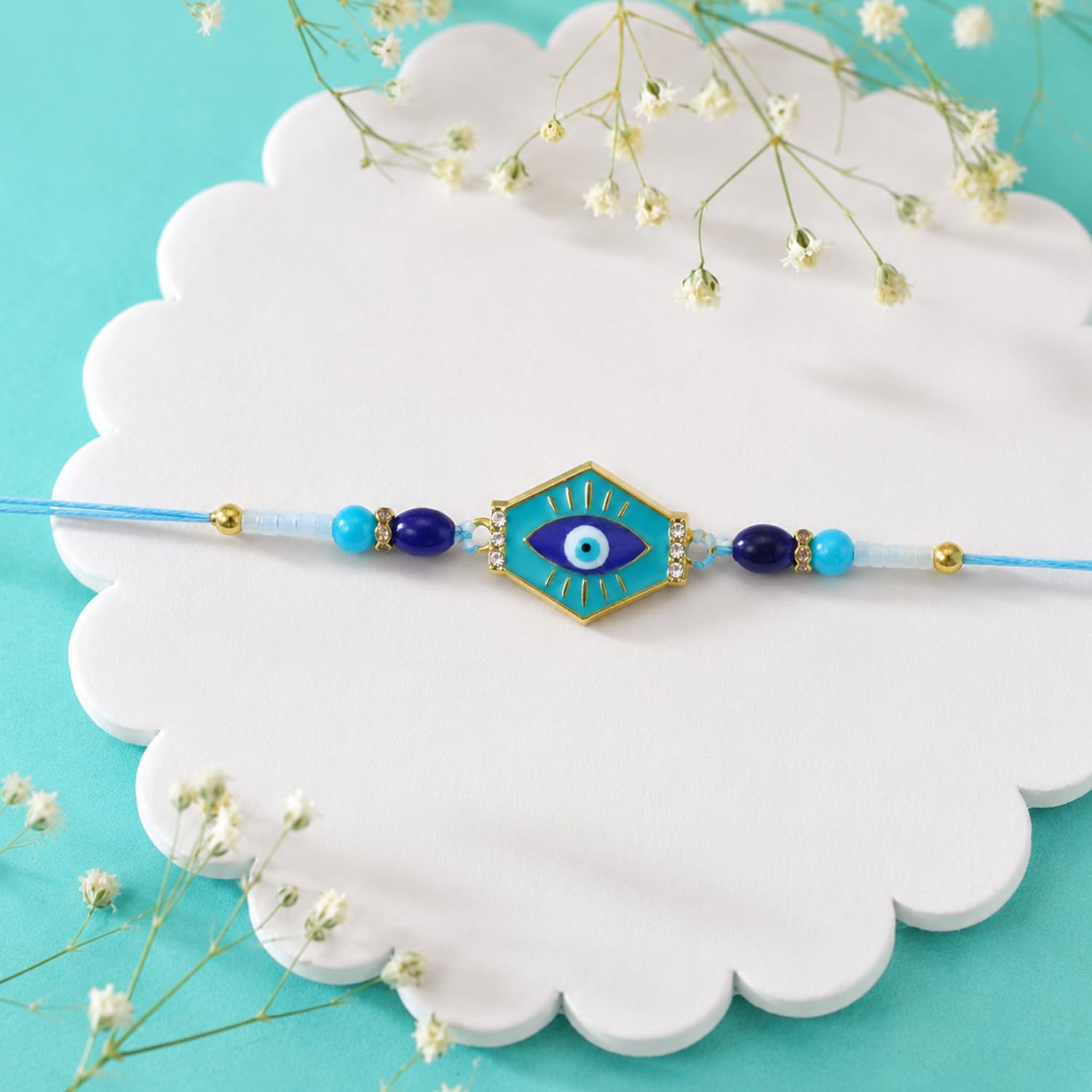 Evil Eye Rakhi for Brother with Choco Almonds 96gm, Roli Tikka & Card, Pack of 5