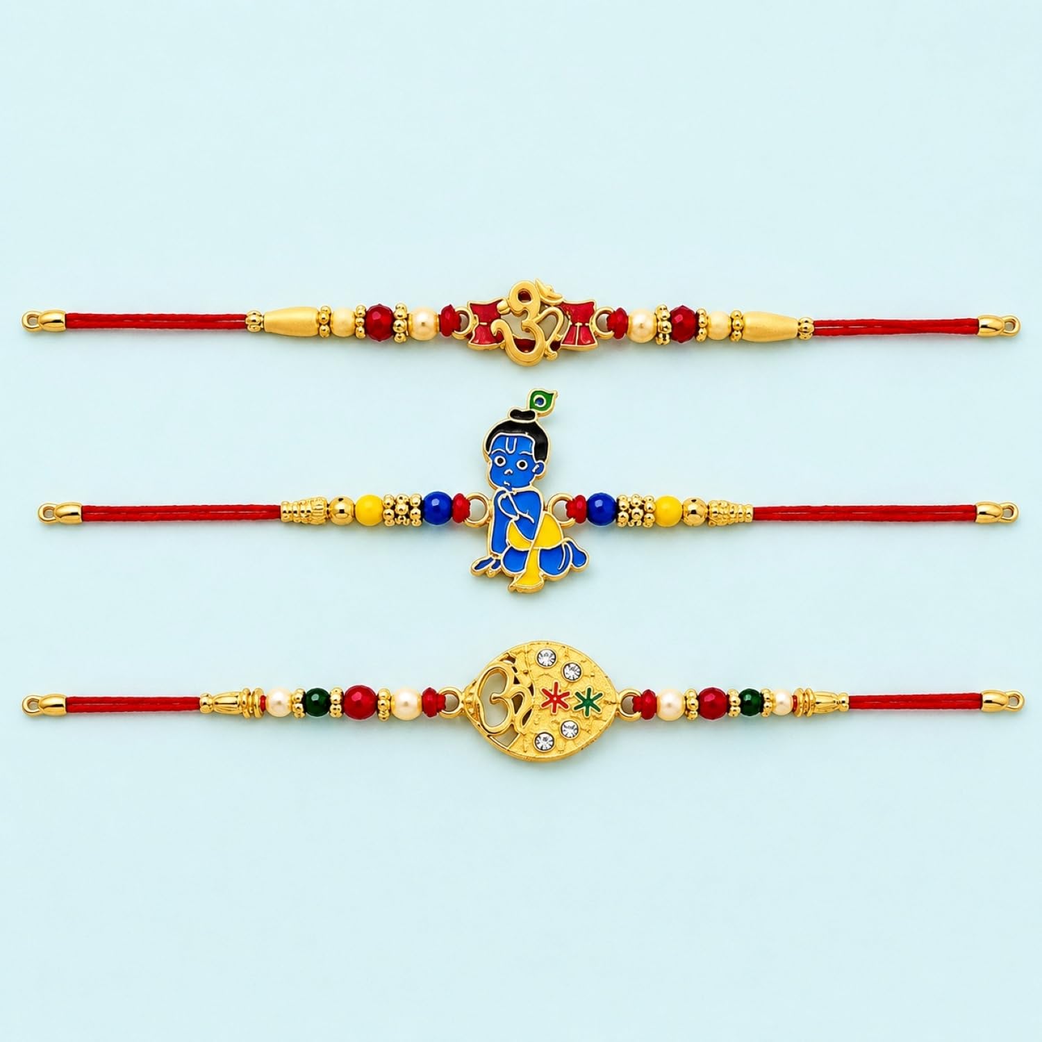 Ganesha Rakhi for Brother with Pooja Thali, Roli Tikka & Card - Pack of 7