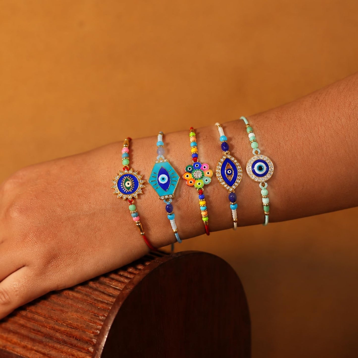 Designer Elegant Rakhi for Brother with Roli Tikka, Pooja Coin & Card, Pack of 8