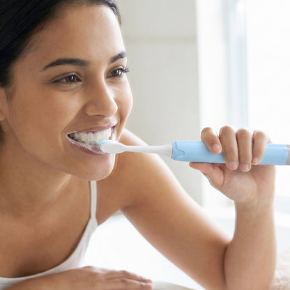 Adult Using Electric Sonic Toothbrush