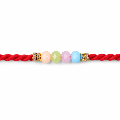 Red Twisted Cord Rakhi with Soft Pastel Multicolour Bead Accents