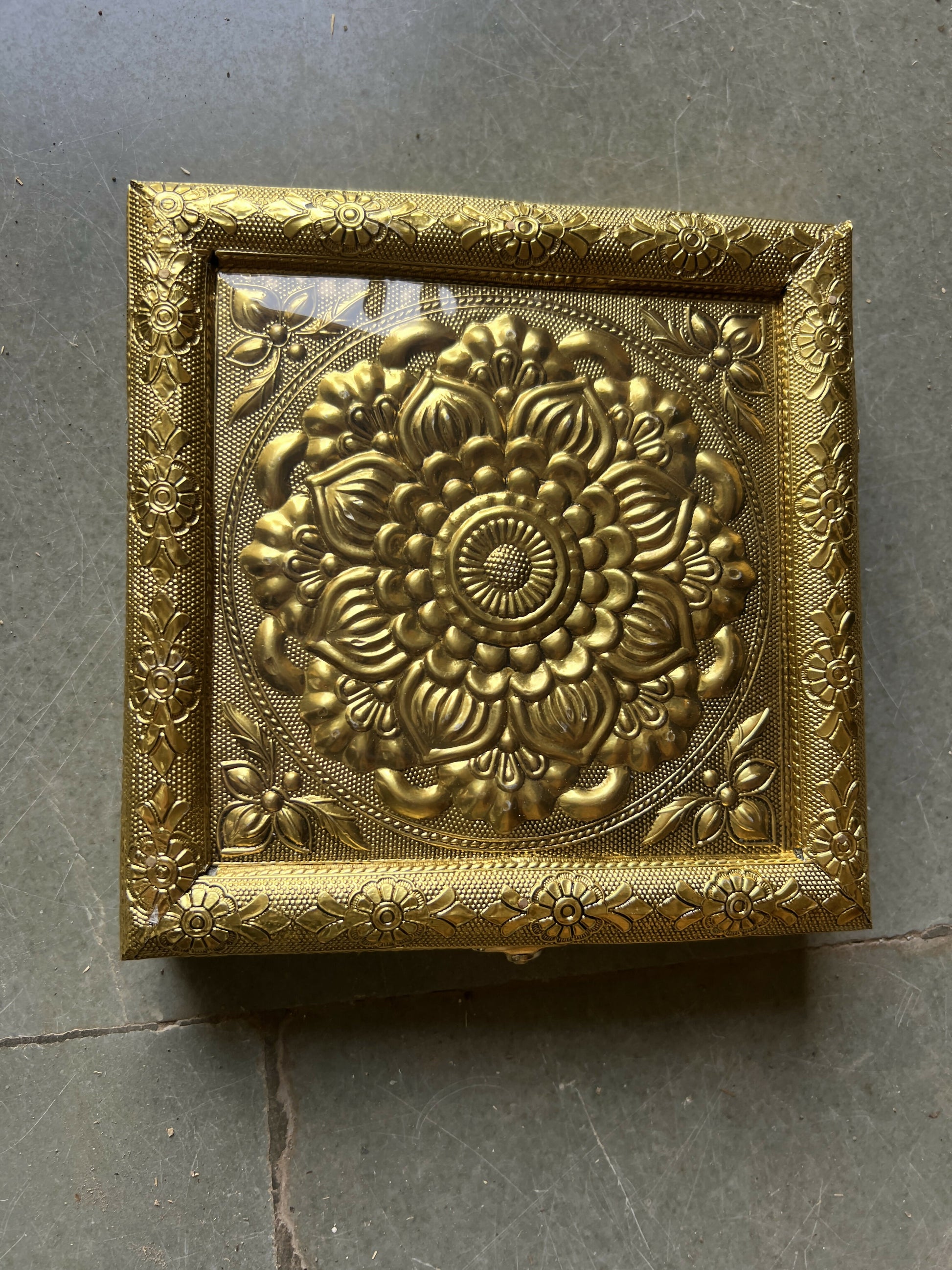 Full view of golden floral mandala embossed metal jewelry box