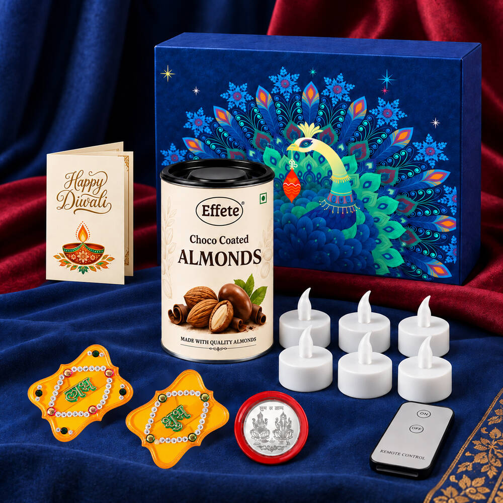 A Diwali gift box with a peacock design, choco almonds, six white LED tealights, a remote, two yellow Shubh-Labh