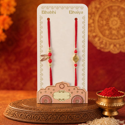 Red Bead Floral Rakhi Pair with Leaf Charms for Bhaiya Bhabhi Couple Celebration
