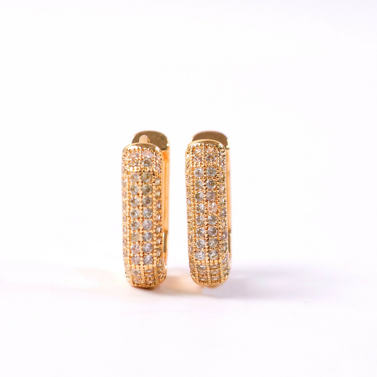 Gold finish CZ hoop earrings styled with ethnic and western outfits