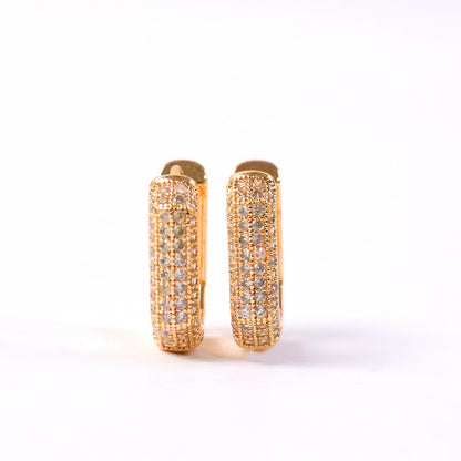 Gold finish CZ hoop earrings styled with ethnic and western outfits