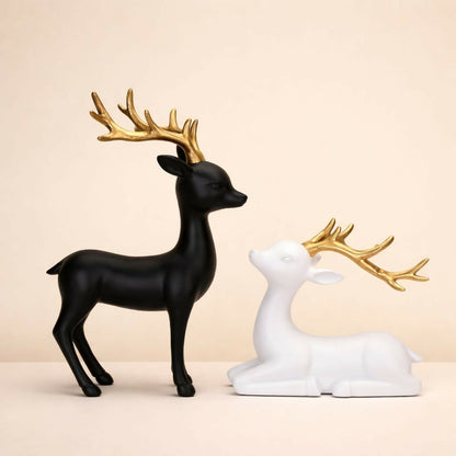 Set of two elegant deer figurines placed on table for home décor