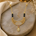 Royal Crystal-Studded Gold-Plated Mangalsutra Necklace with Ruby Accent & Teardrop Pendant for Women