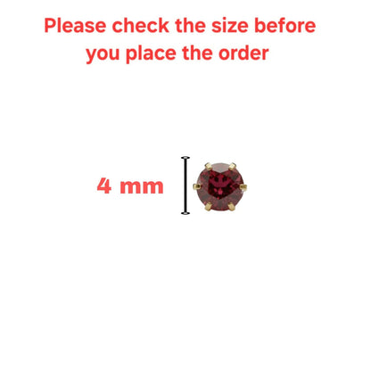 Side view of gold plated ruby nose stud with four-prong claw setting