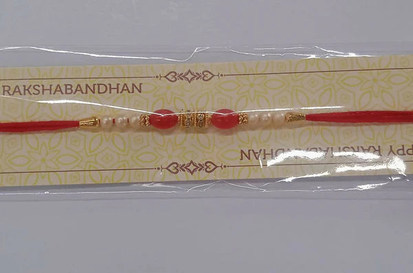 Pearl Beaded Rakhi – Traditional Red & Gold Elegance