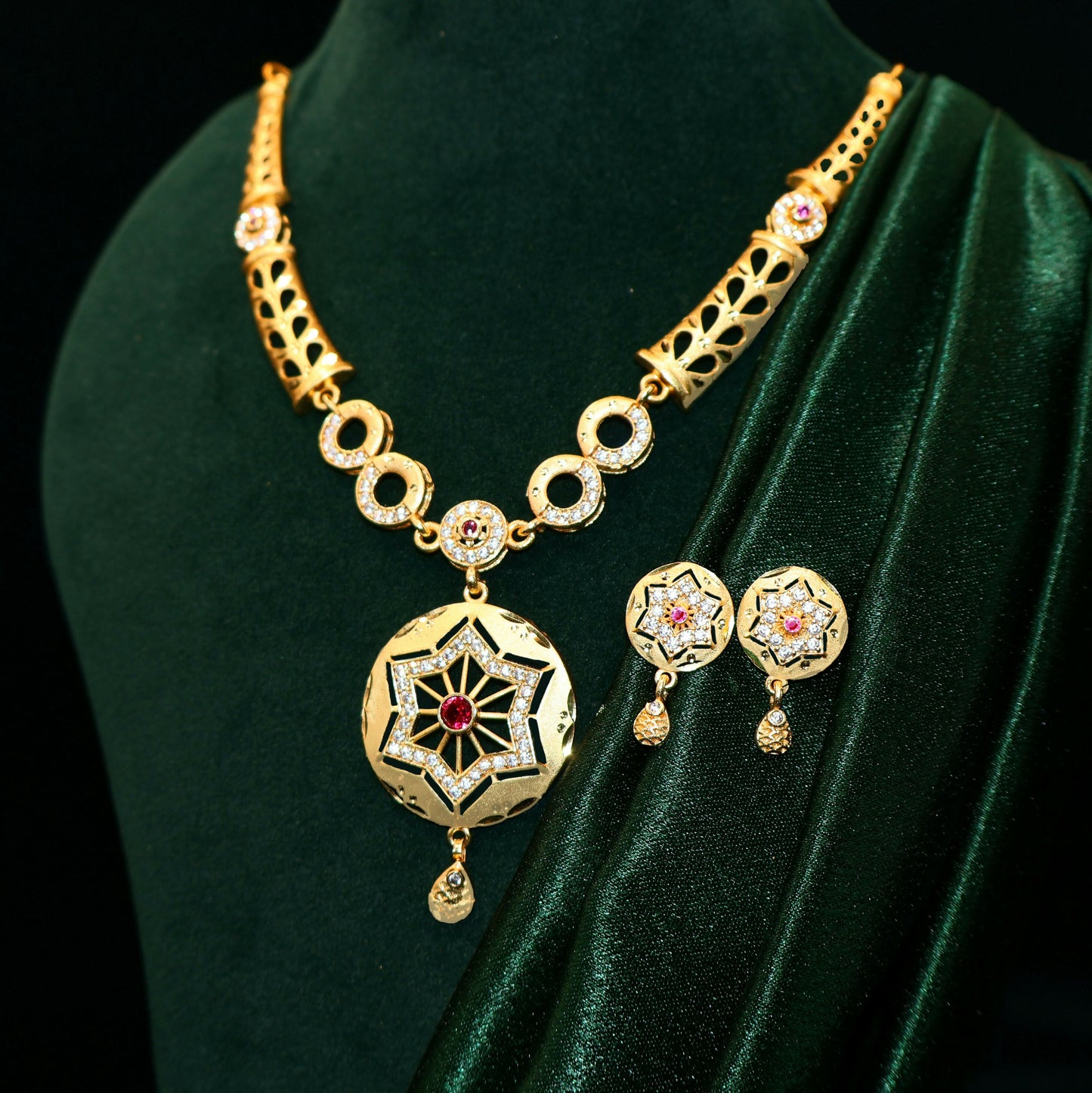 Gold Plated Star Pendant Forming Necklace Set with AD & Ruby Accents
