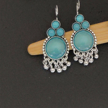 Beautiful peacock design oxidized jhumka earrings in silver finish