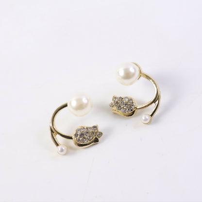 Elegant golden finish on pearl crystal stud earrings