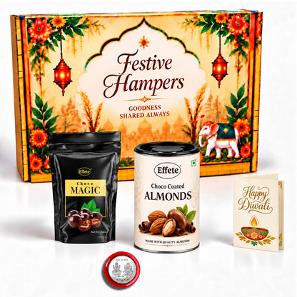A festive hamper box with a black pouch of Choco Magic, a tin of Choco Coated Almonds, a silver coin, and a greeting card.